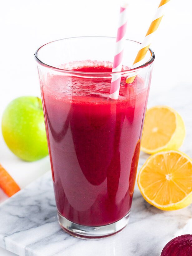 apple beets and carrots juice in a glass