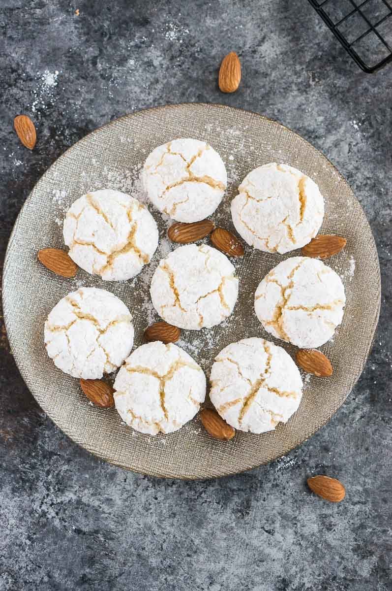 gluten-free amaretti cookies on a silver plate