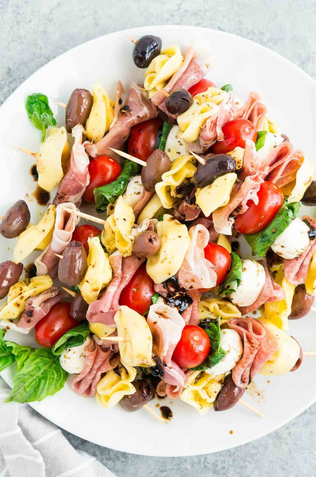 close up image of antipasto skewers on a platter