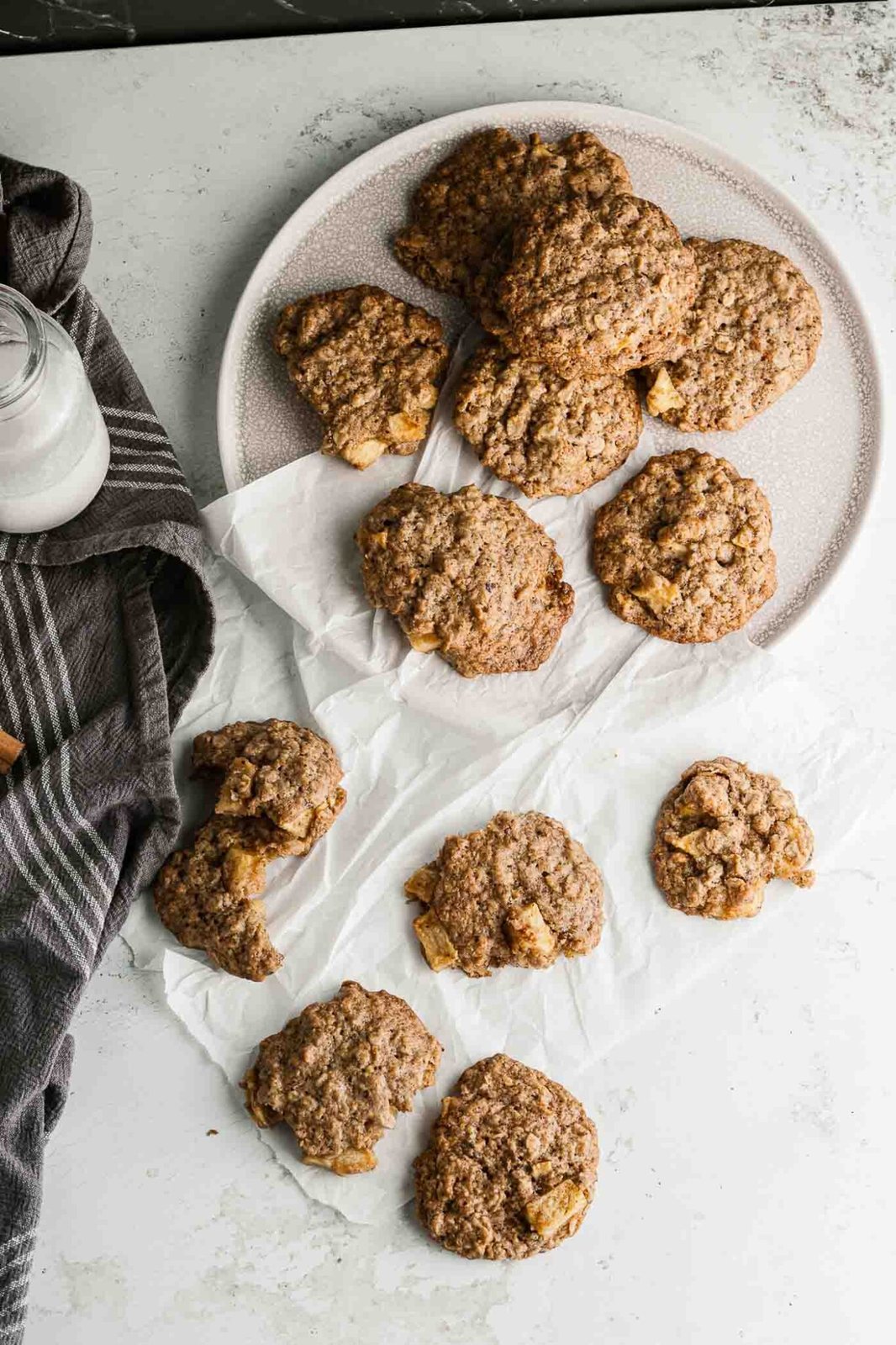 several cookies on a plate and table