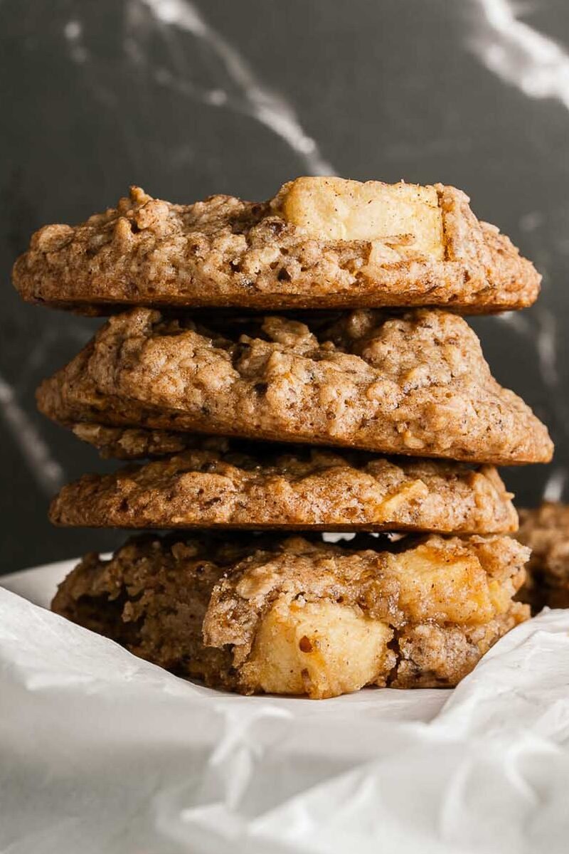 stacked cookies on parchment paper