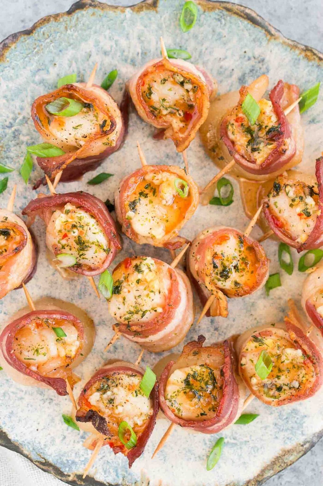 bacon wrapped scallops with pepper jelly as an appetizer