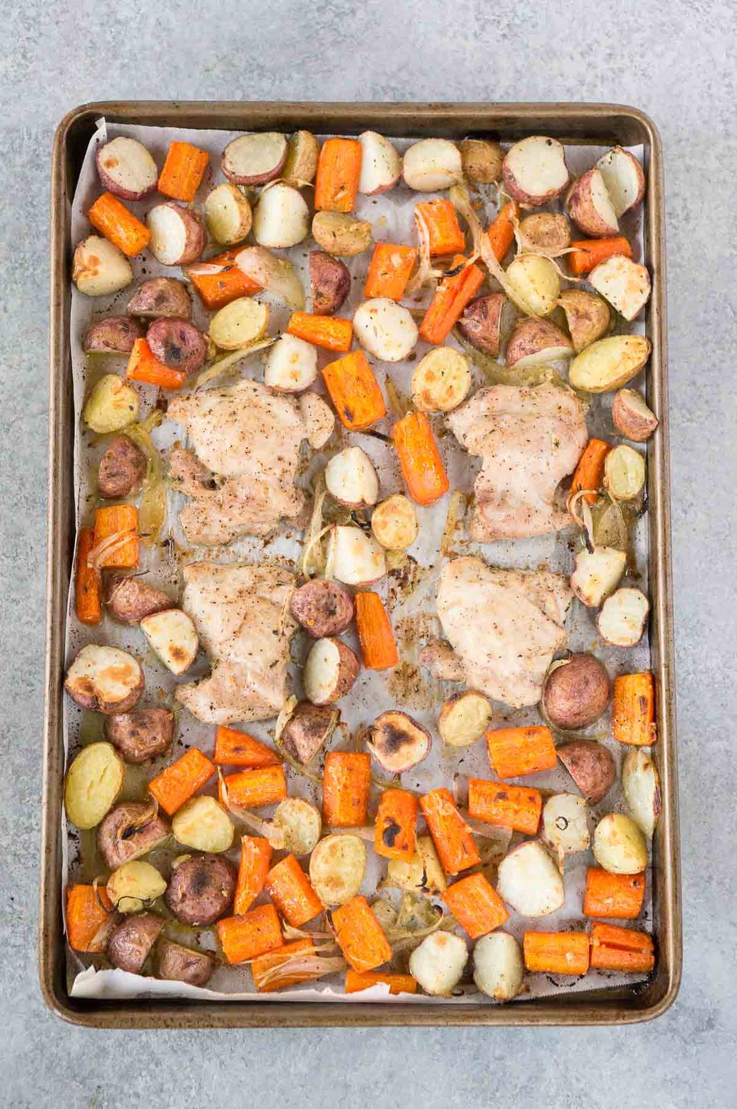 baked chicken thighs and potatoes