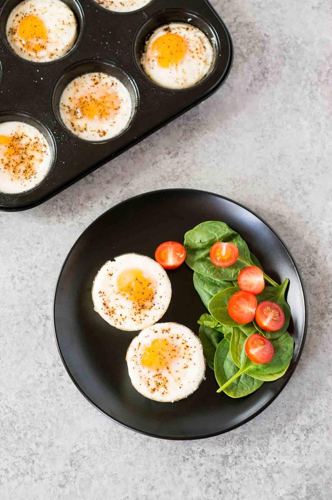 egg cups on a plate with vegetables