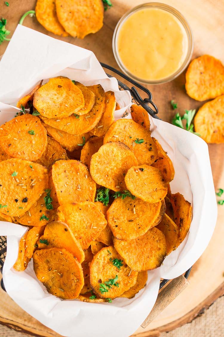 Sweet Potato Chips in a basket with an aioli sauce