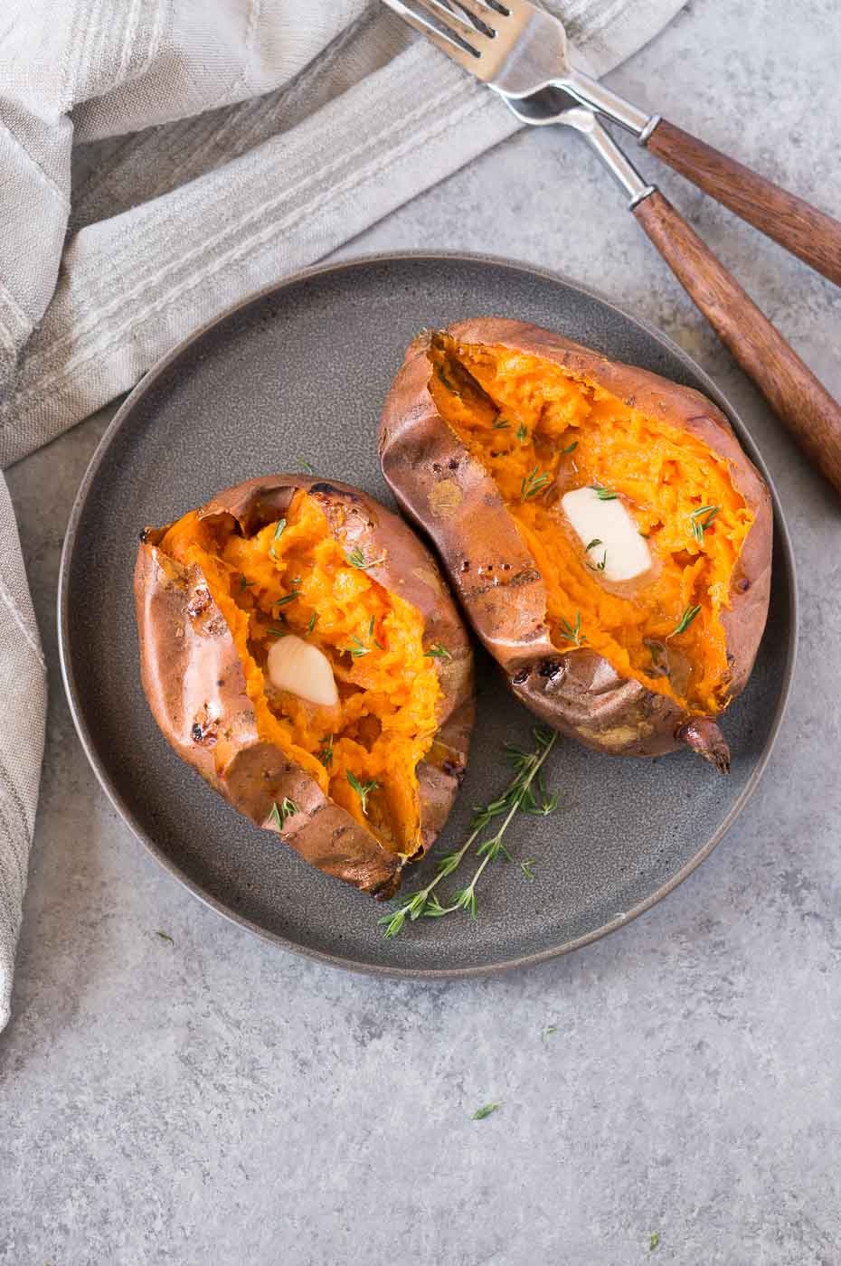 sweet potatoes served with butter on a plate
