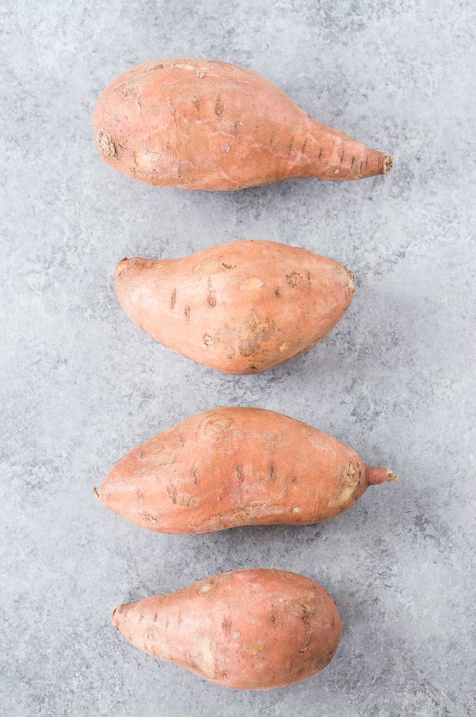 sweet potatoes on a board