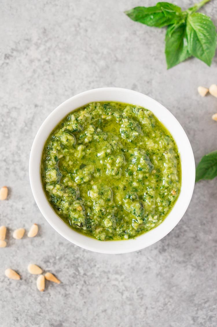 basil pesto sauce in a white bowl