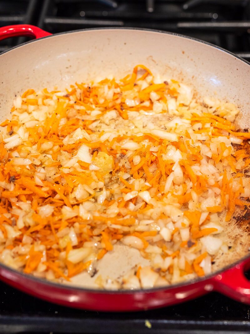 Saute the onion and carrot to soften