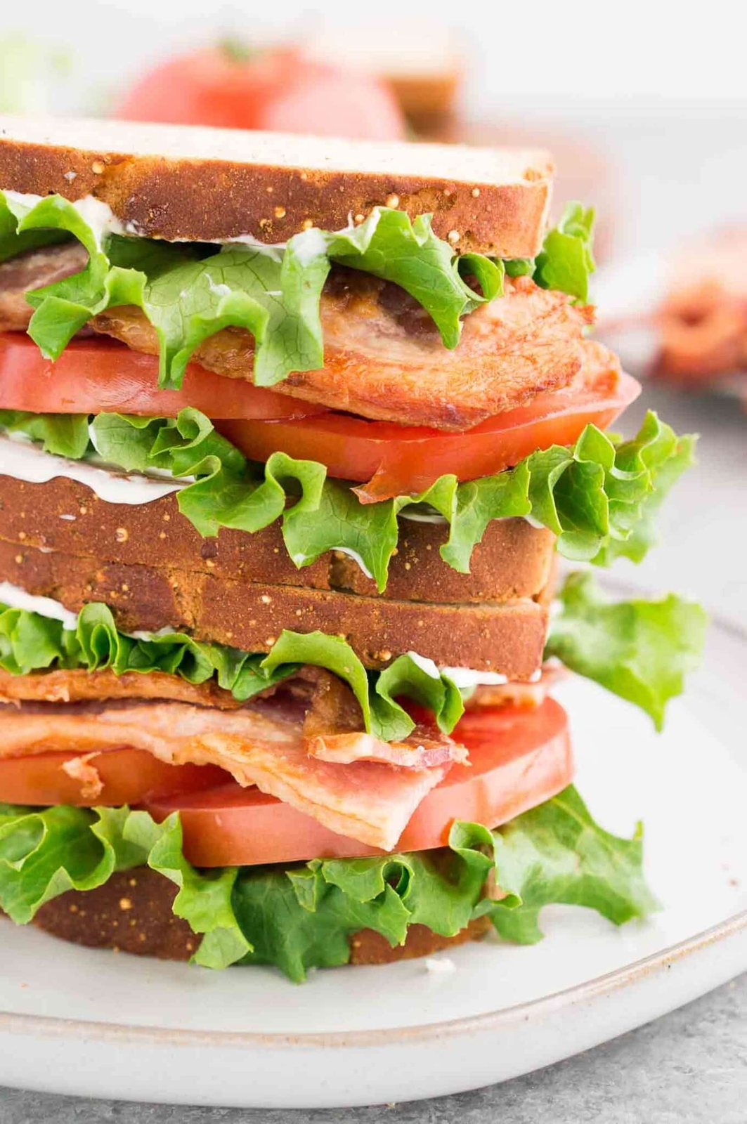 close up of stacked classic BLT sandwich