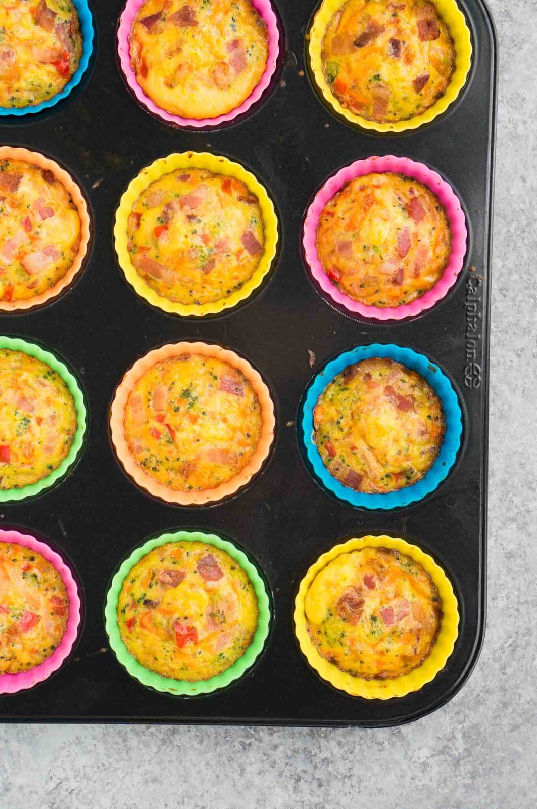 egg breakfast muffins in muffin tin