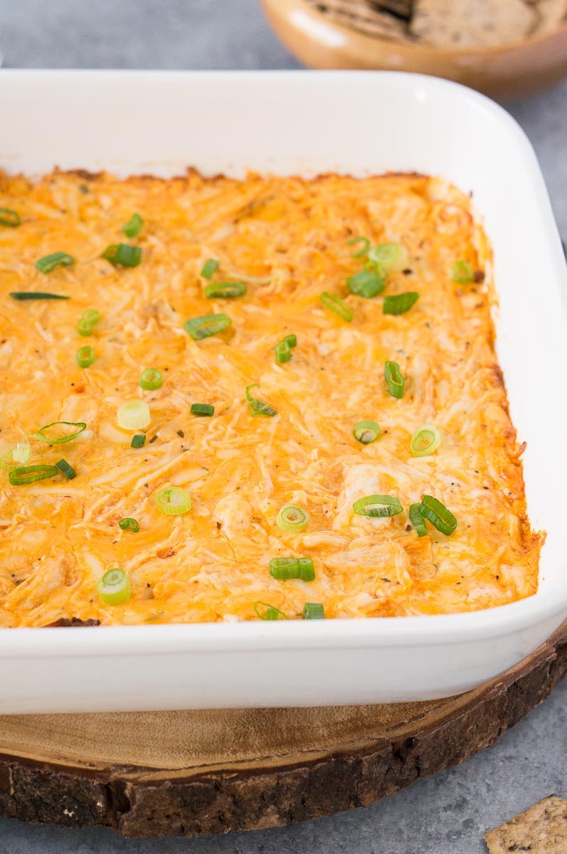 creamy chicken buffalo dip in a white dish