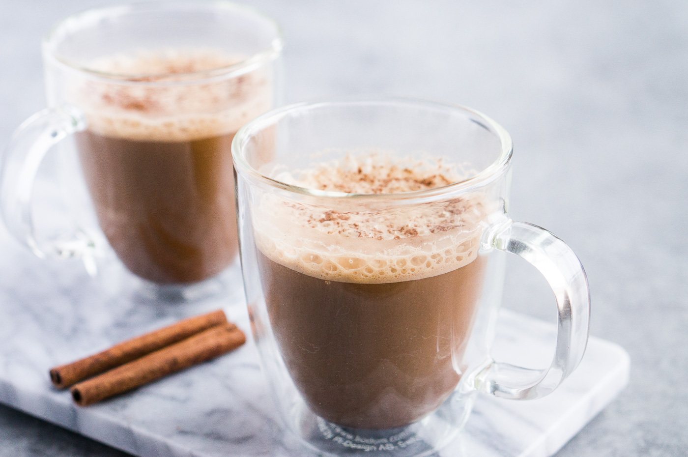butter coffee in two glass cups