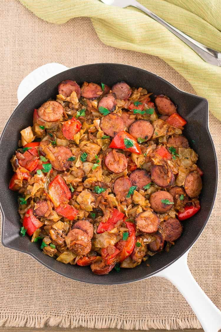 Cabbage and Smoked Sausage recipe with vegetables served in a skillet