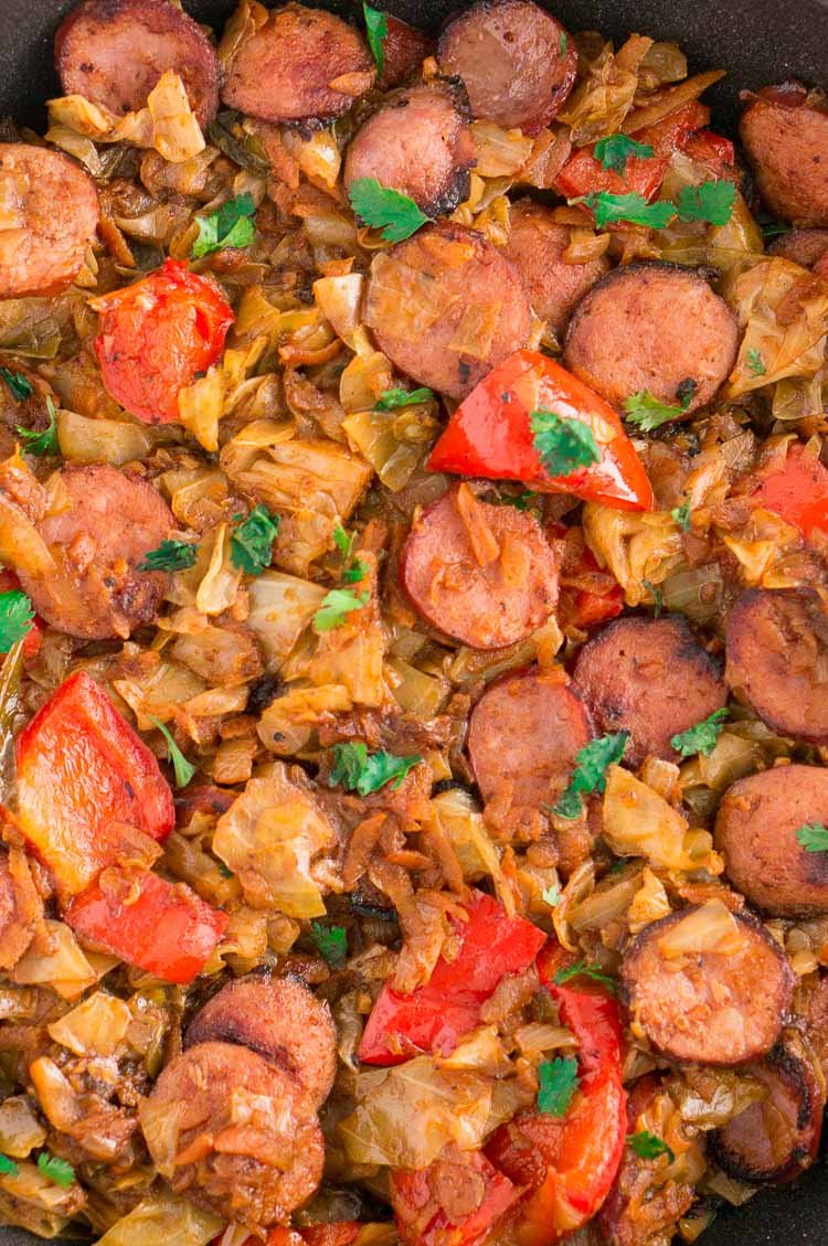 Cabbage and Sausage with peppers, onions and garnished with parsley
