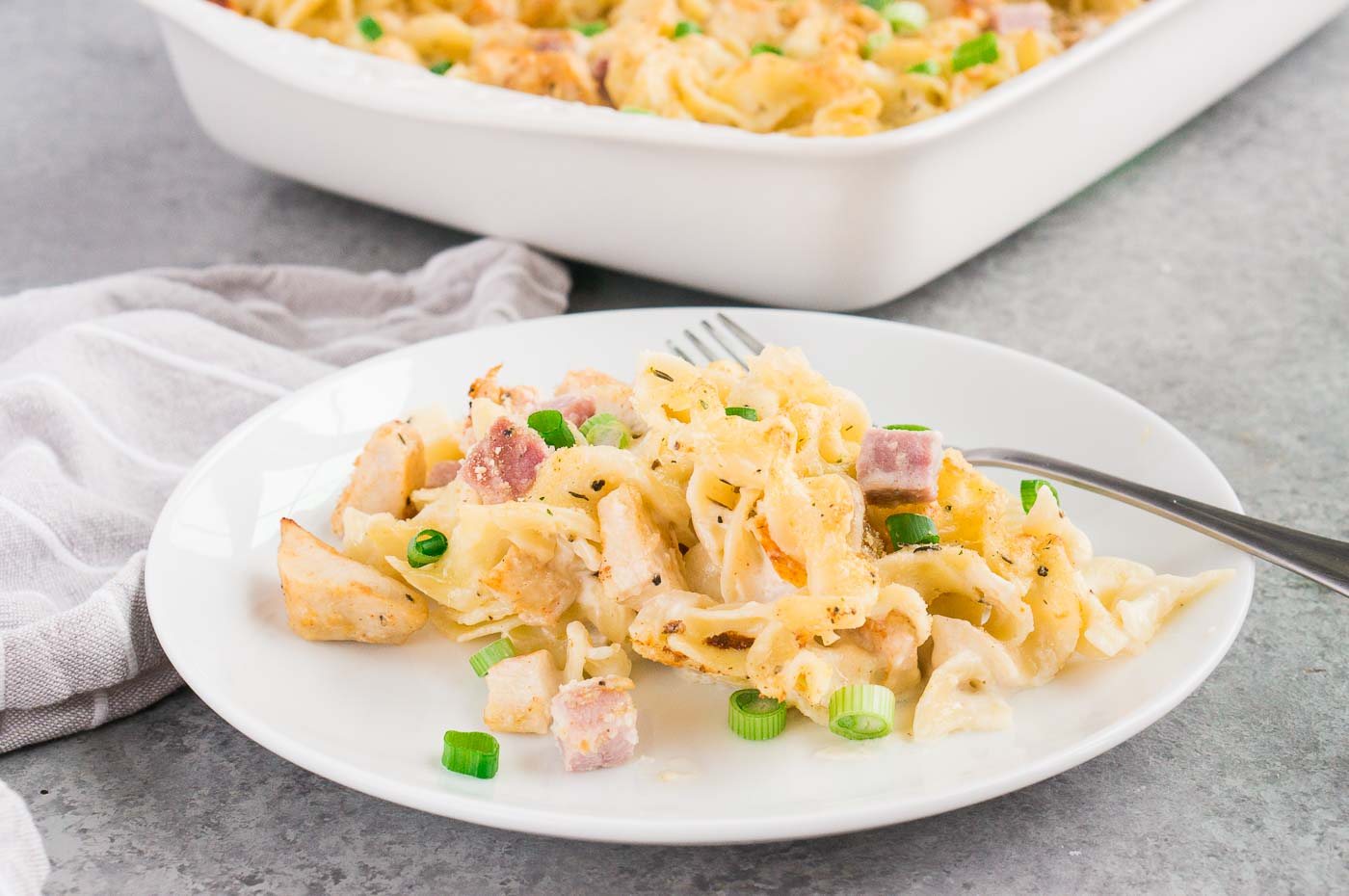 close up image of chicken cordon bleu casserole on a plate