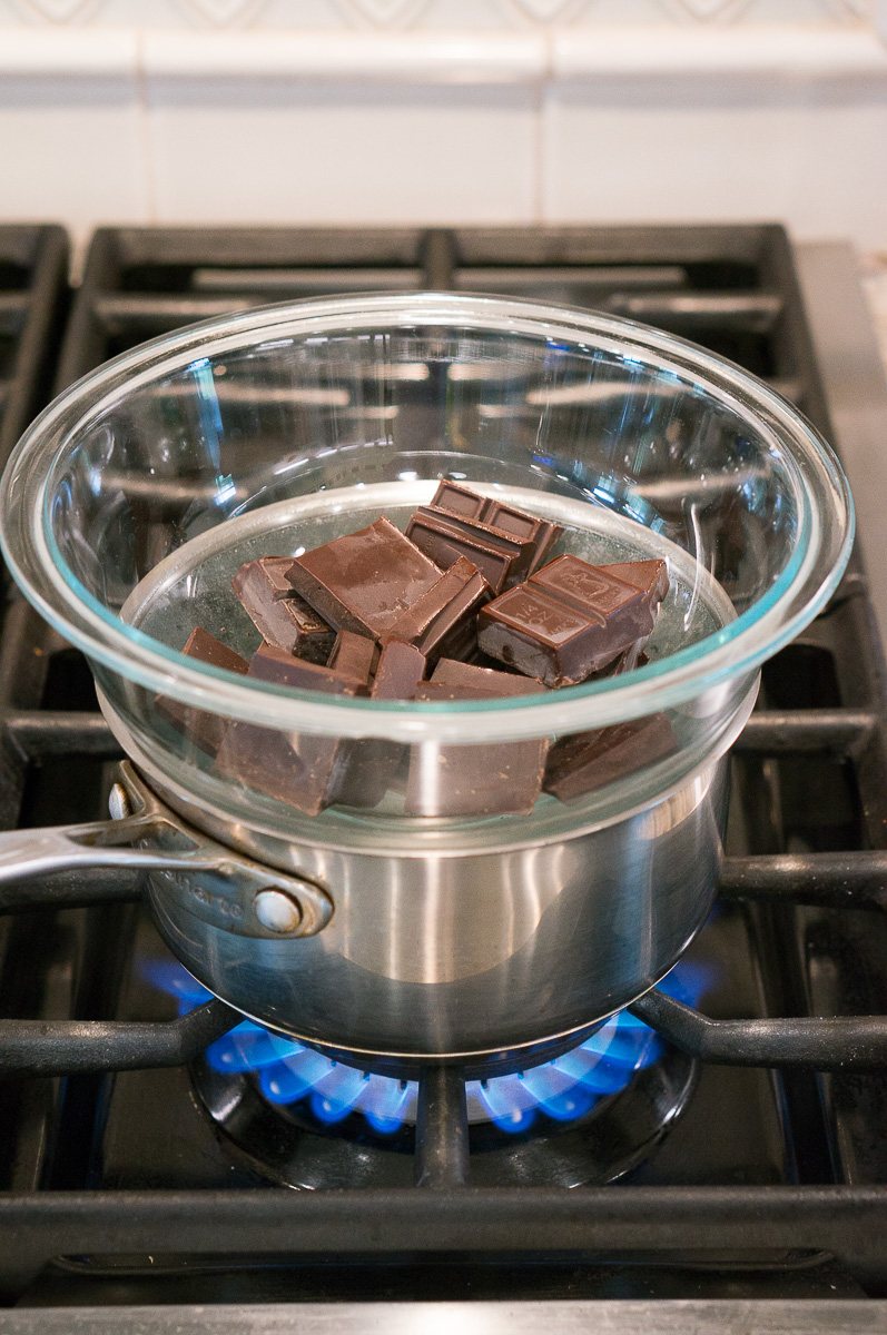 melting chocolate on the stove over hot water