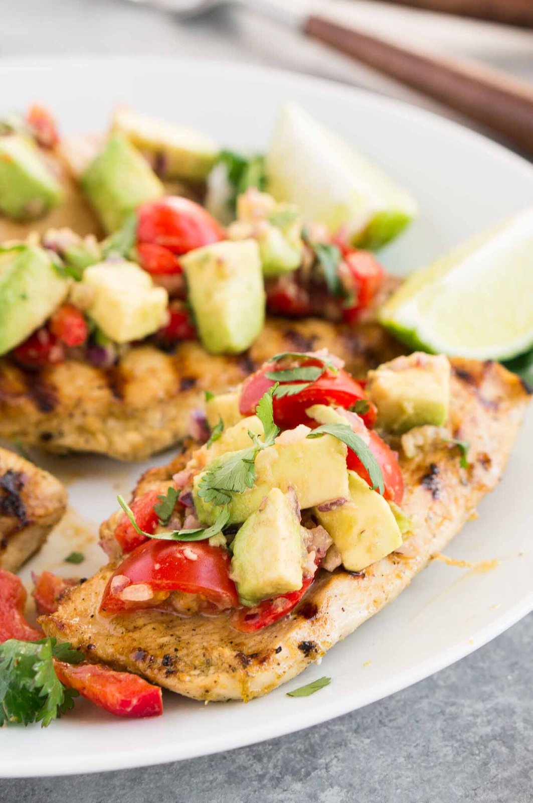 cilantro lime chicken topped with avocado salsa
