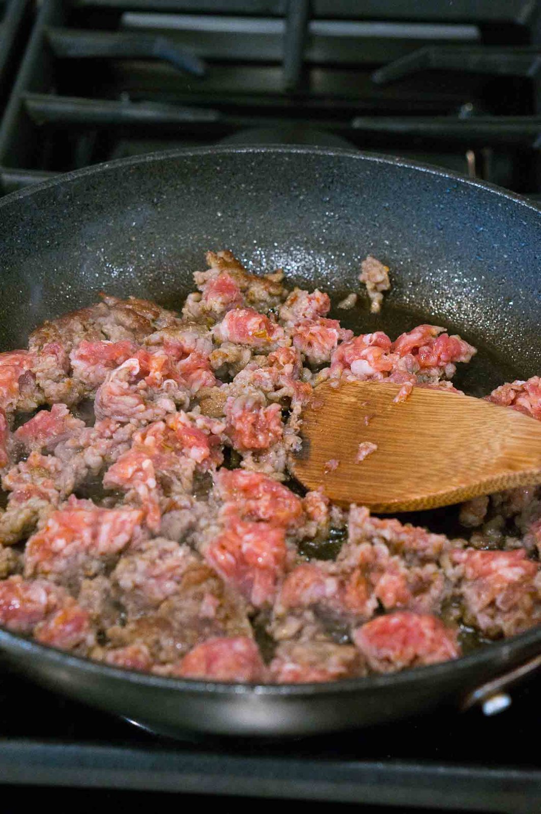 browing sausage in a skillet