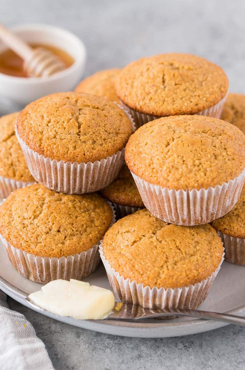 sweet corn muffins with honey on a plate