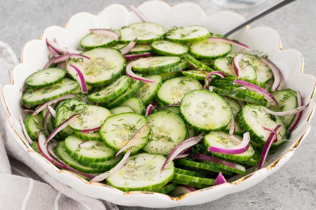best cucumber salad in a white bowl