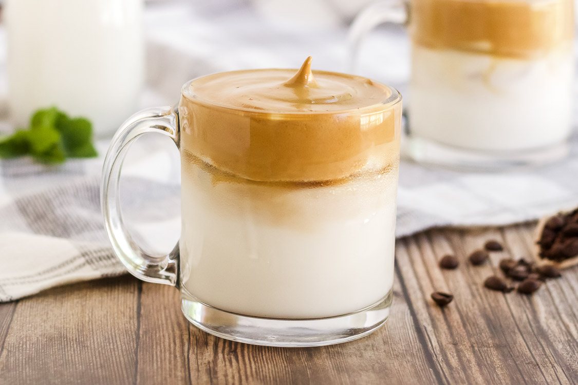 tiktok dalgona whipped coffee served in glass mug
