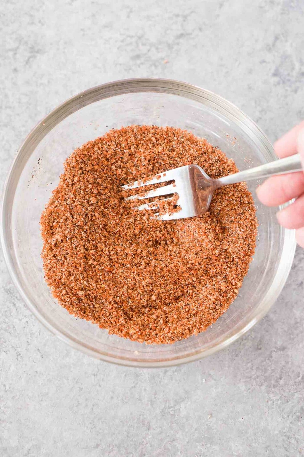 mixing spices to make bbq dry rub