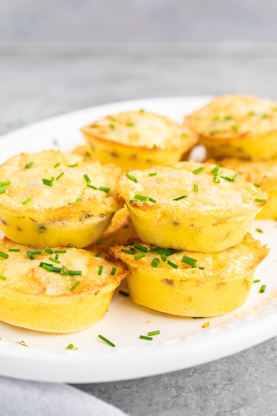 stacked egg muffins on a plate
