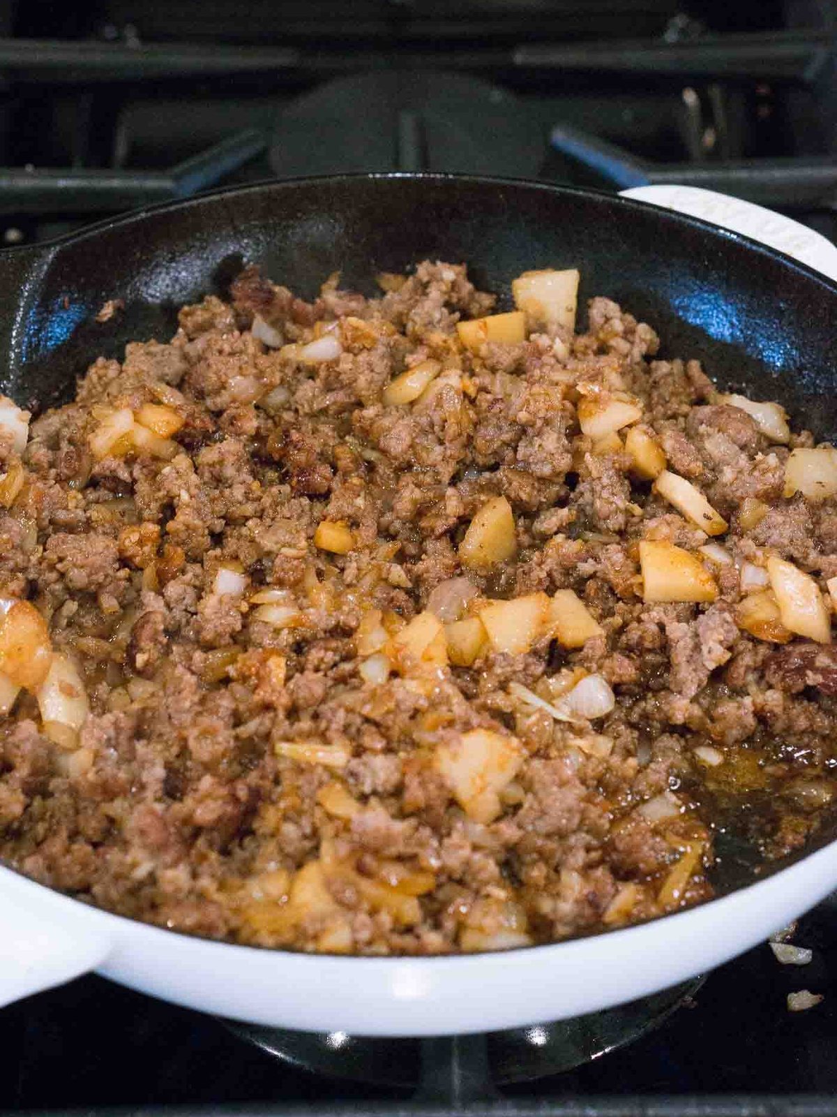 adding aromatics in egg roll in a skillet