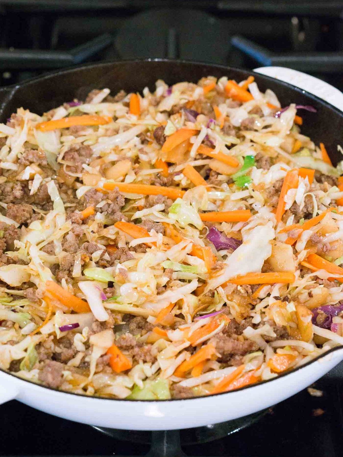 cooking egg roll bowl recipe in a skillet