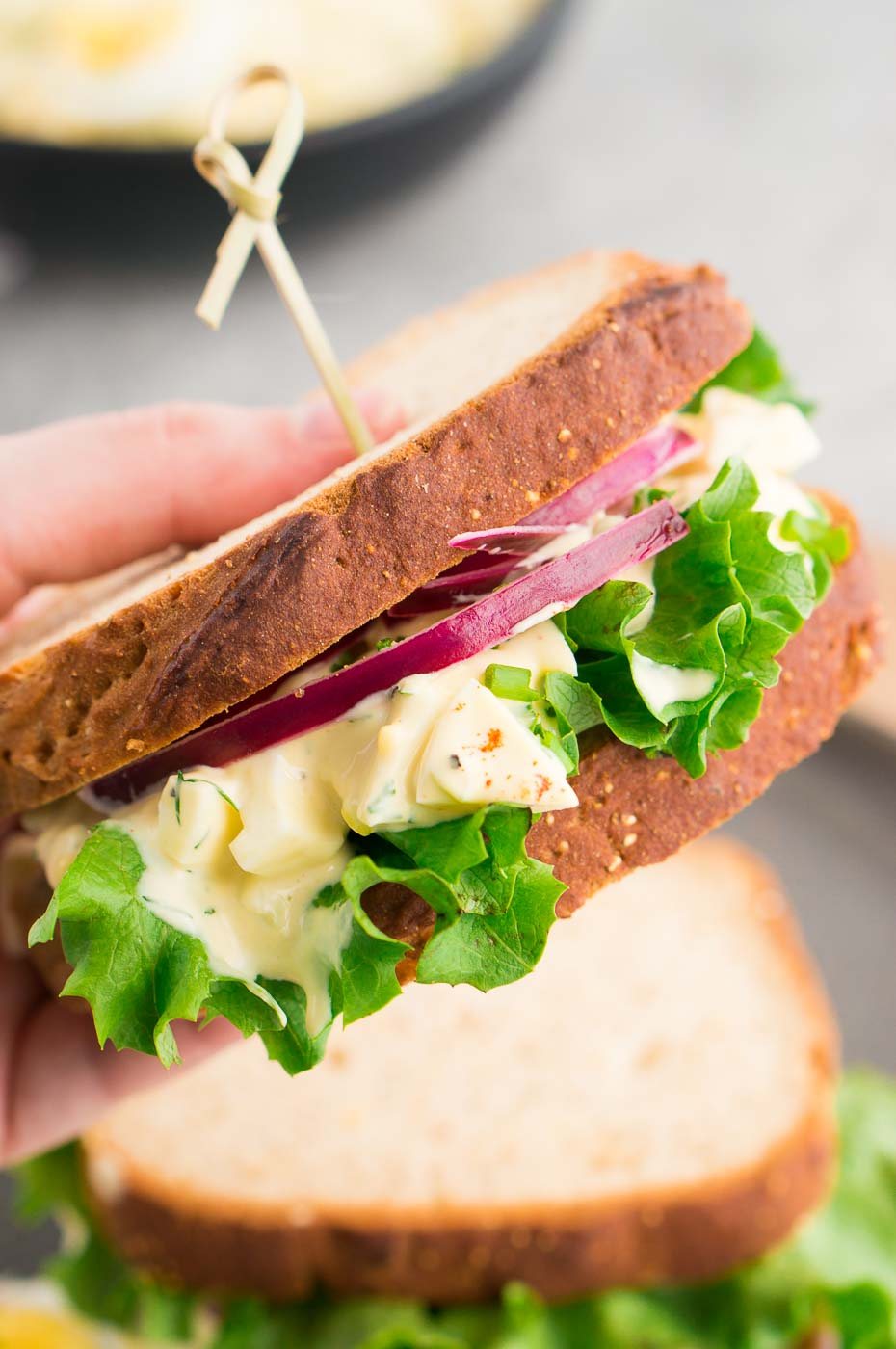 holding a sandwich