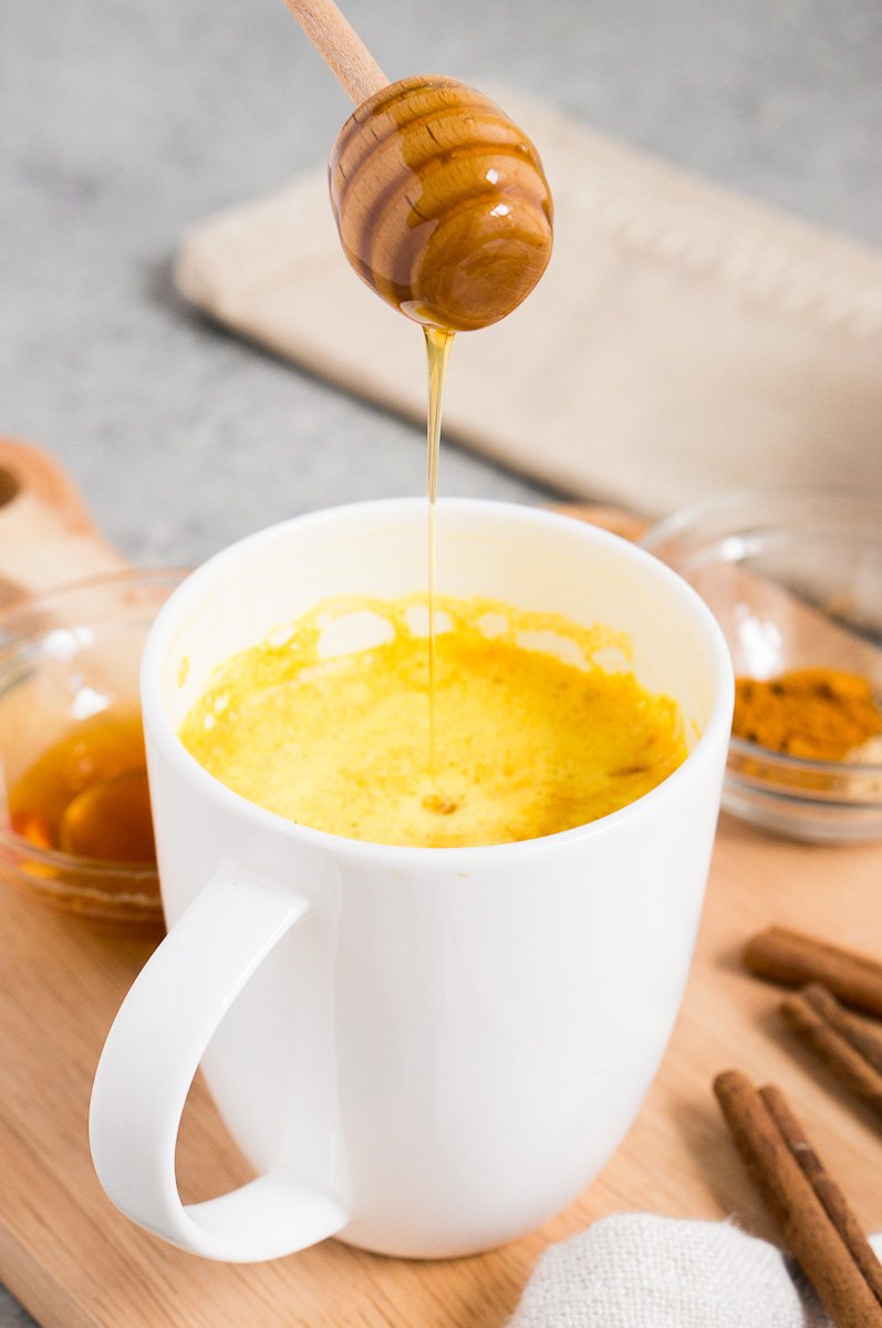 adding honey
