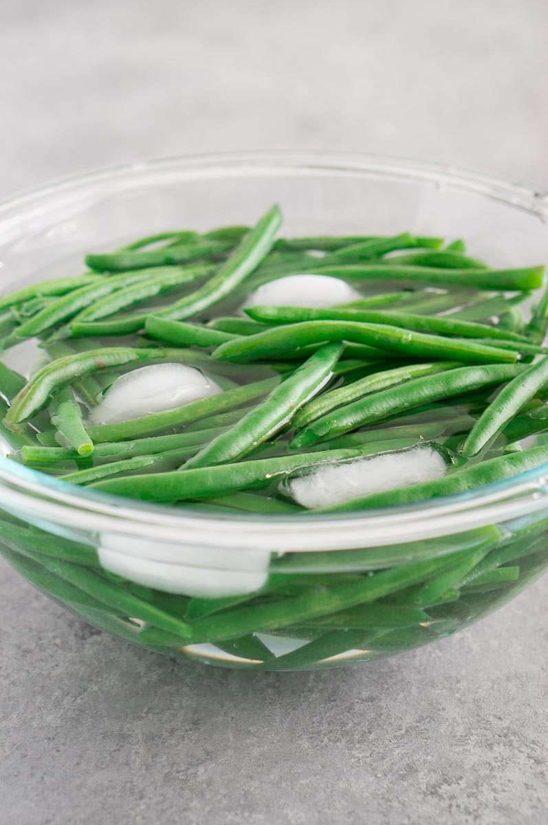shocking blanched green beans in ice cold water