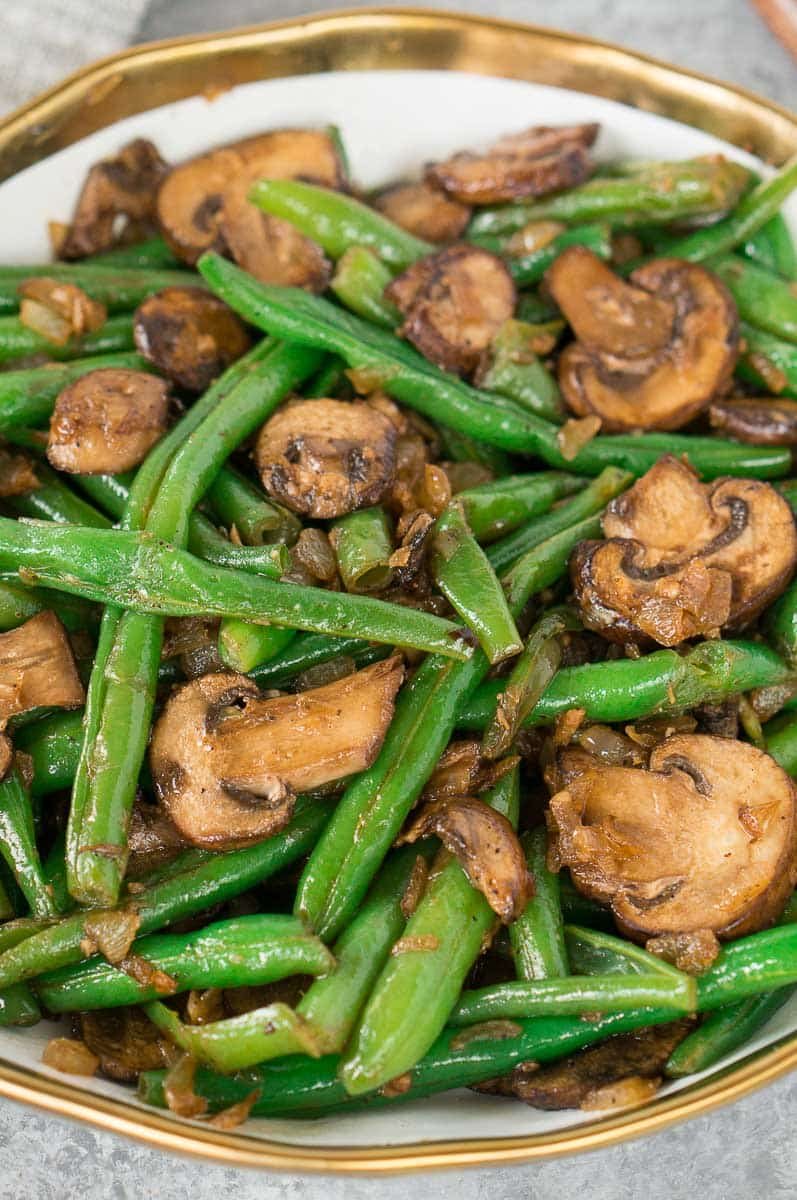 cooked green bean recipe with mushrooms in a bowl