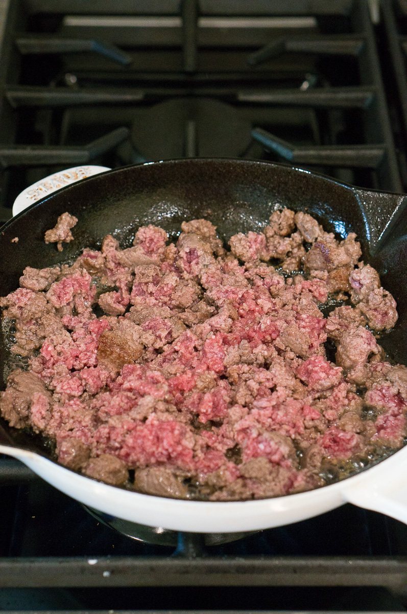 cooking ground beef in a skillet
