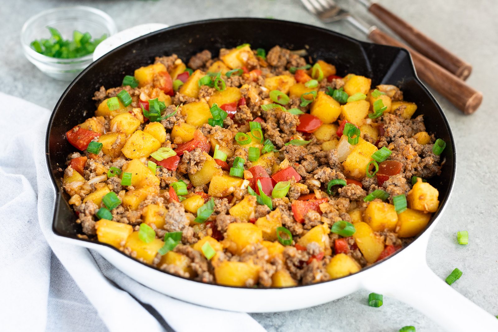 recipe for ground beef and potatoes in a skillet