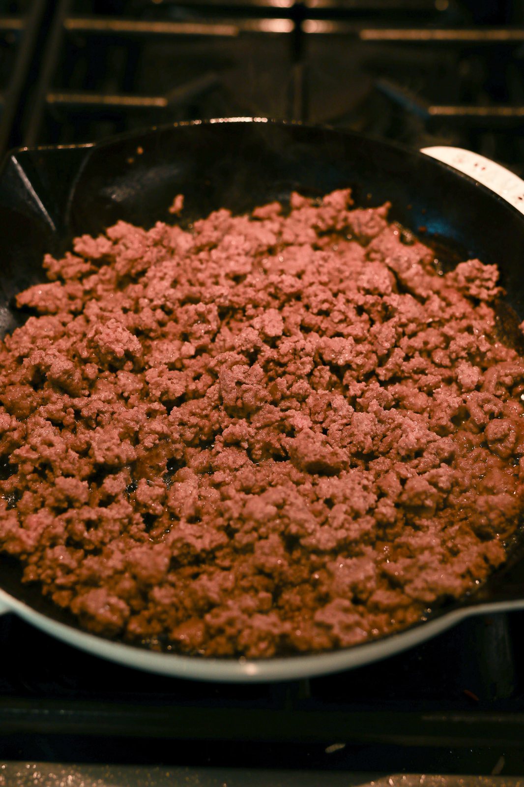 cooking ground beef in a skillet