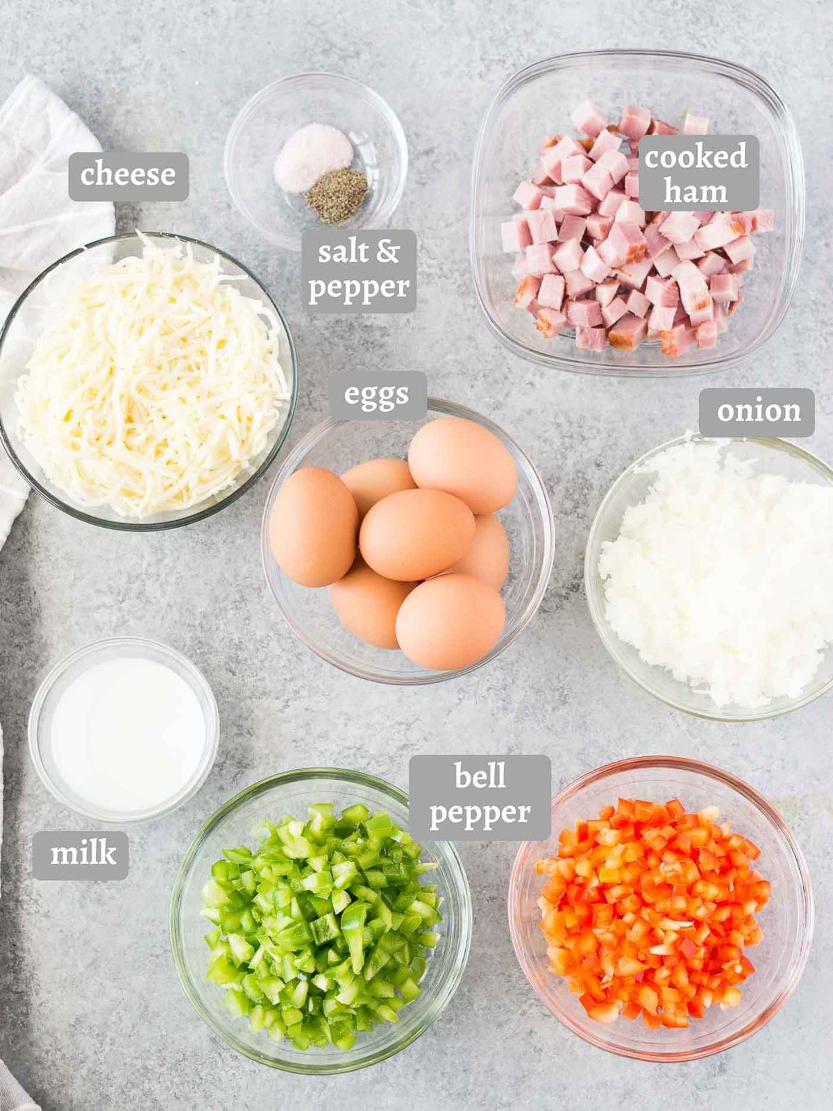 ingredients for breakfast egg muffins with ham and cheese