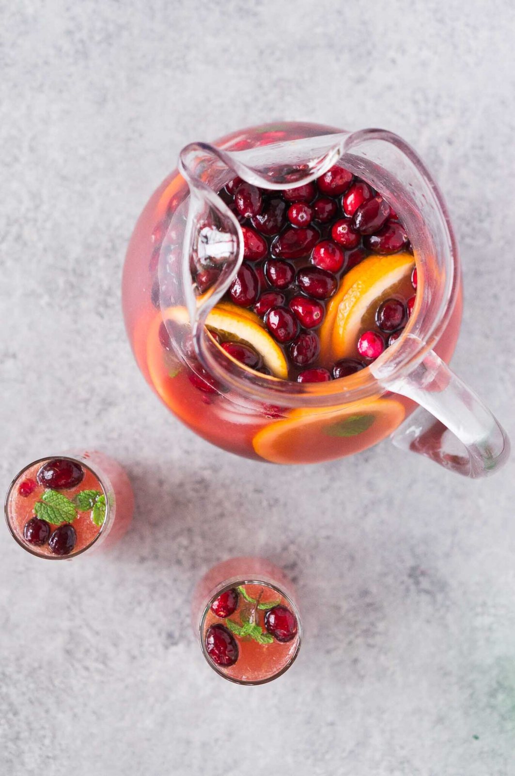 looking down to a pitcher and glasses with punch
