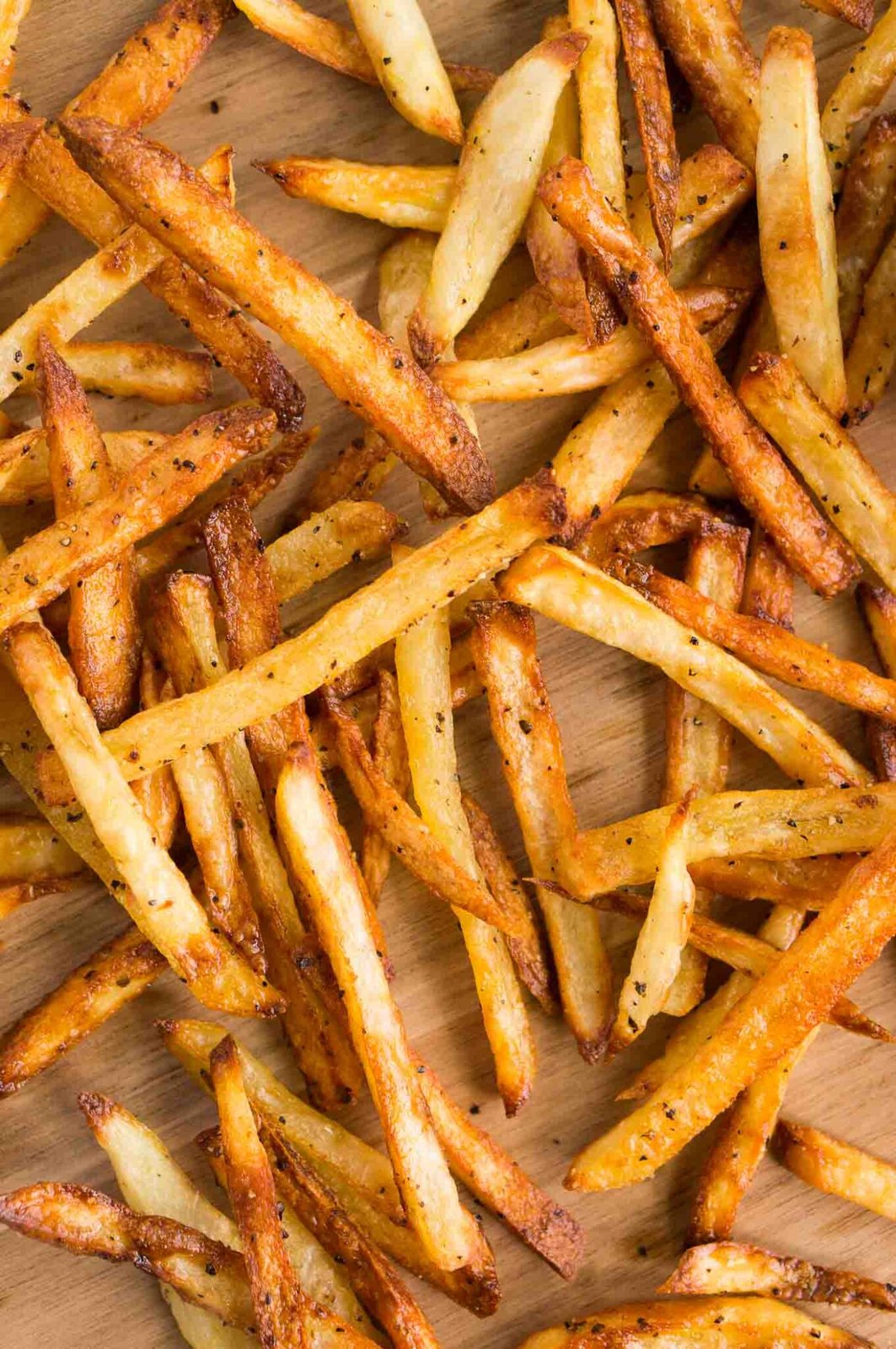 oven baked fries served on a board