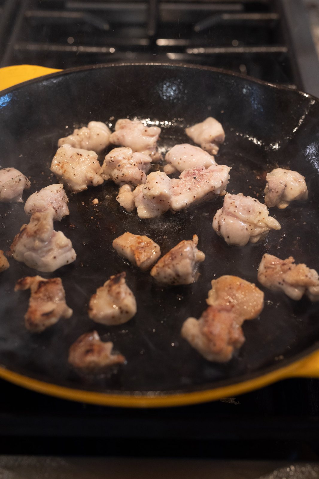 cooking chicken in a skillet