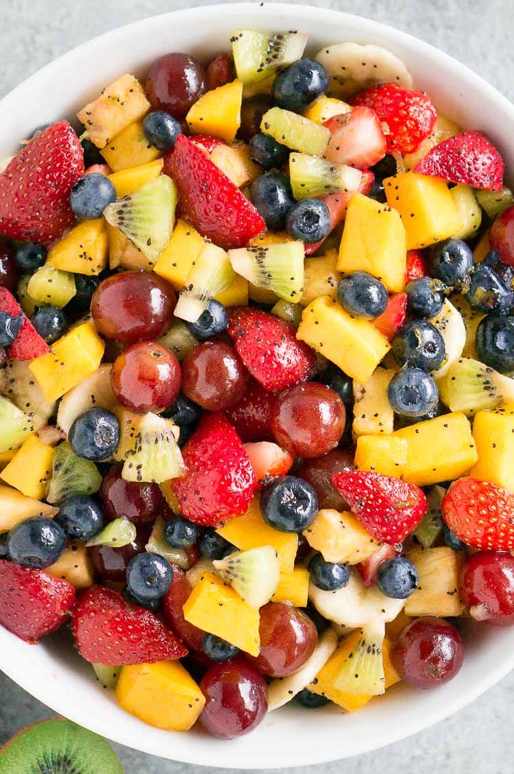 Easy healthy fruit salad recipe with fresh summer fruit and honey lime dressing