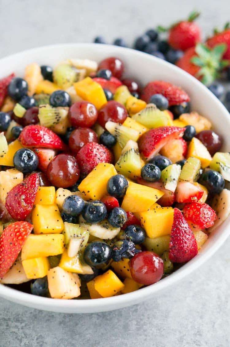 Honey lime fruit salad recipe with fresh fruit and poppy seed dressing