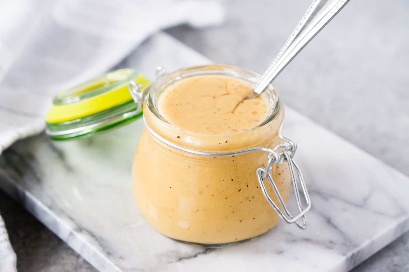 honey mustard salad dressing in a jar