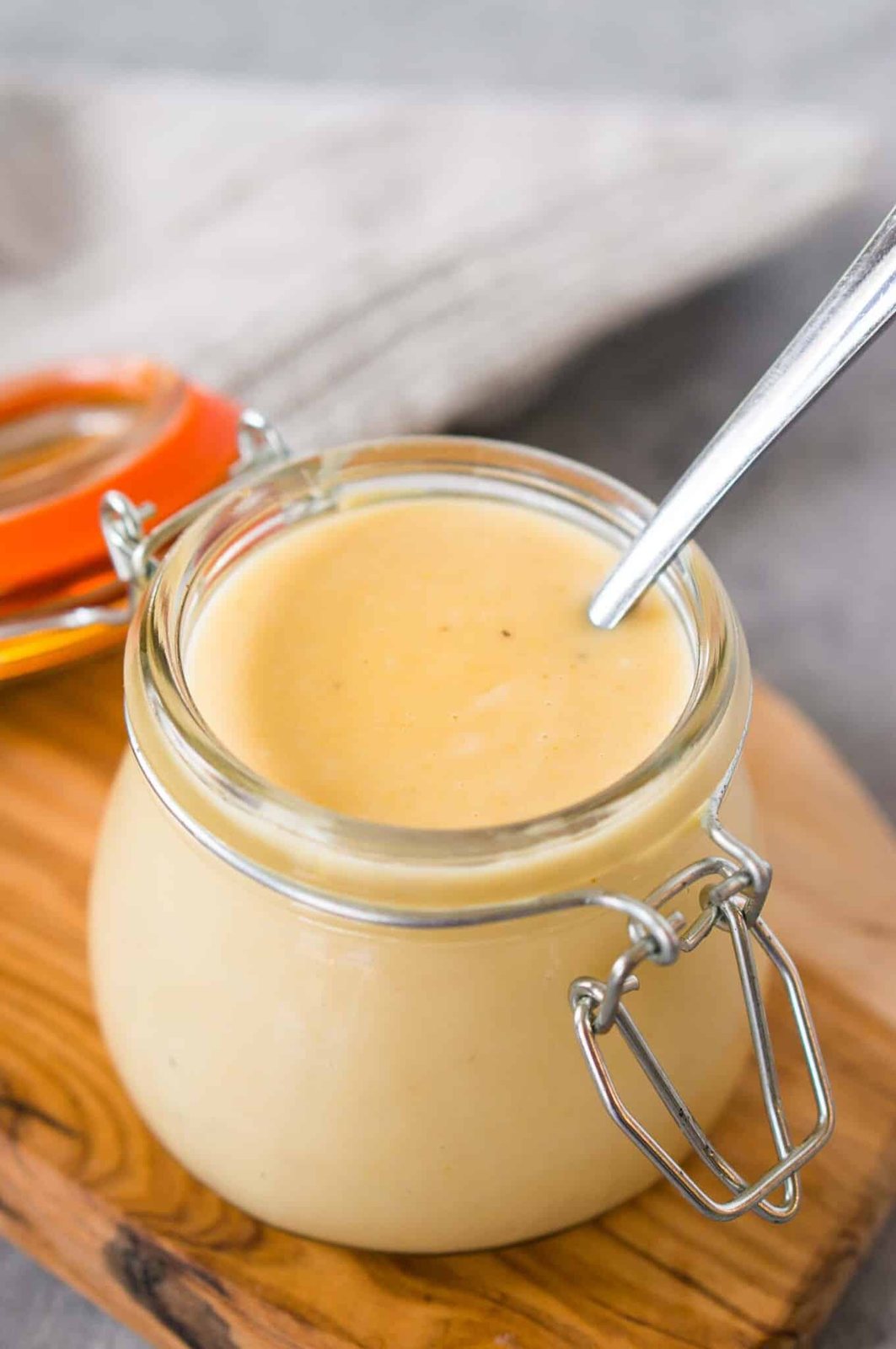 homemade honey mustard sauce in a jar