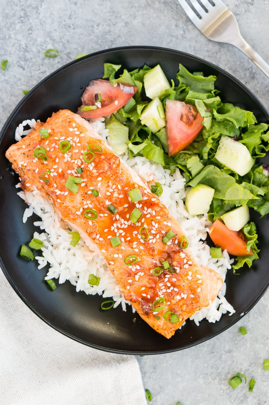 plated baked salmon with sides on a plate