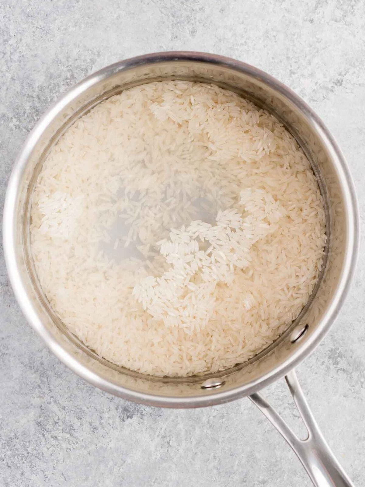 rice in a pot with water