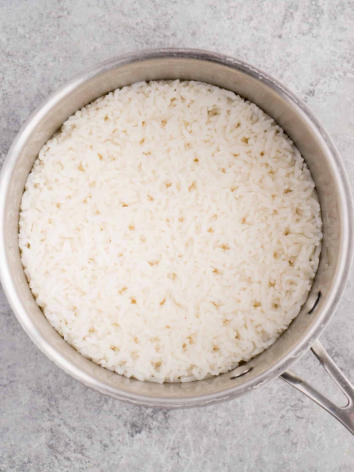 cooked white rice in a pot