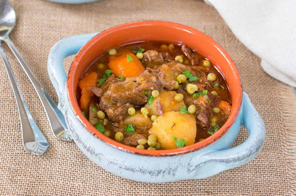 beef stew in blue clay bowl