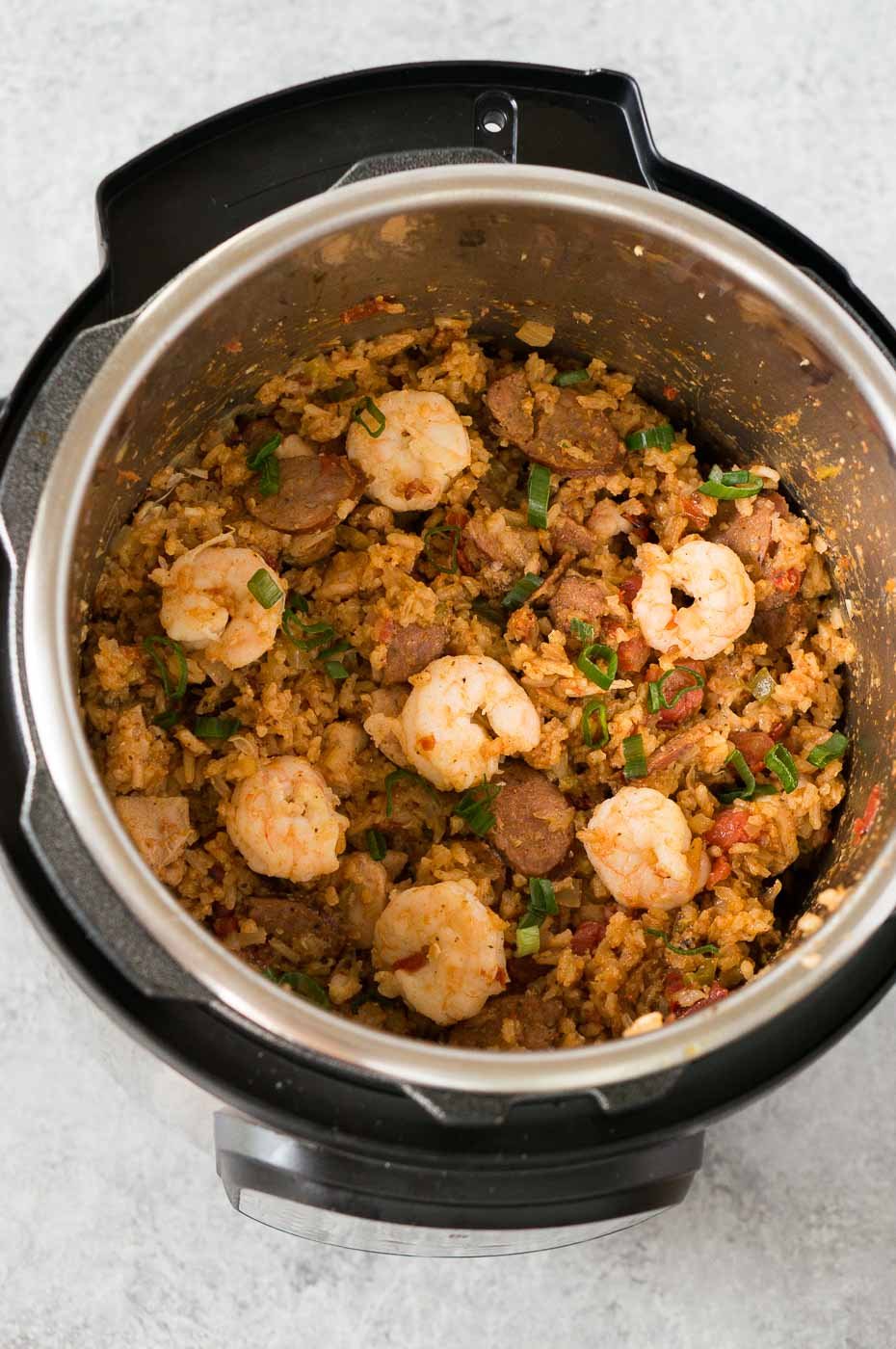 adding shrimp to the jambalaya